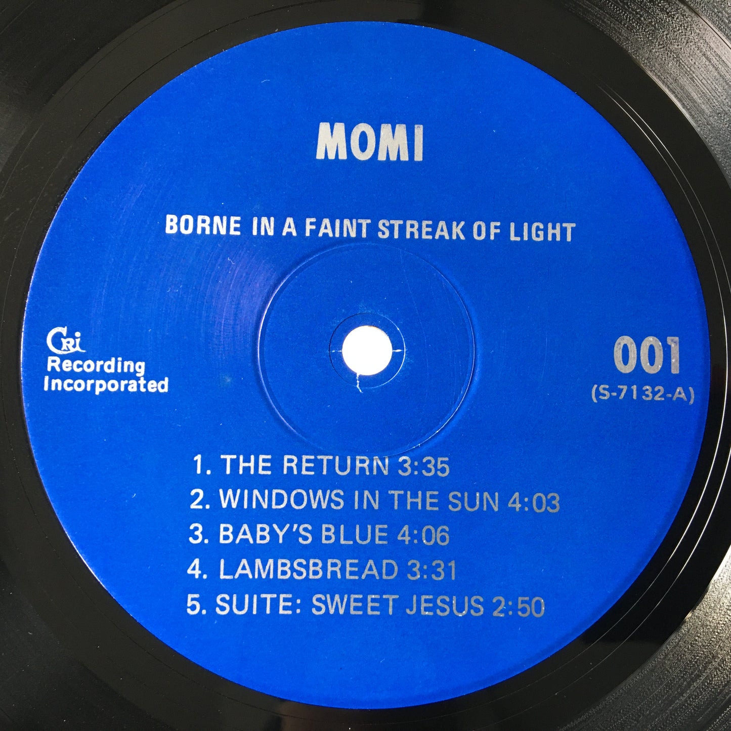 Momi – Borne In A Faint Streak Of Light